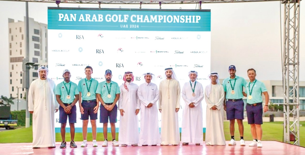 Qatar's golfers pose for a group photo with officials. 