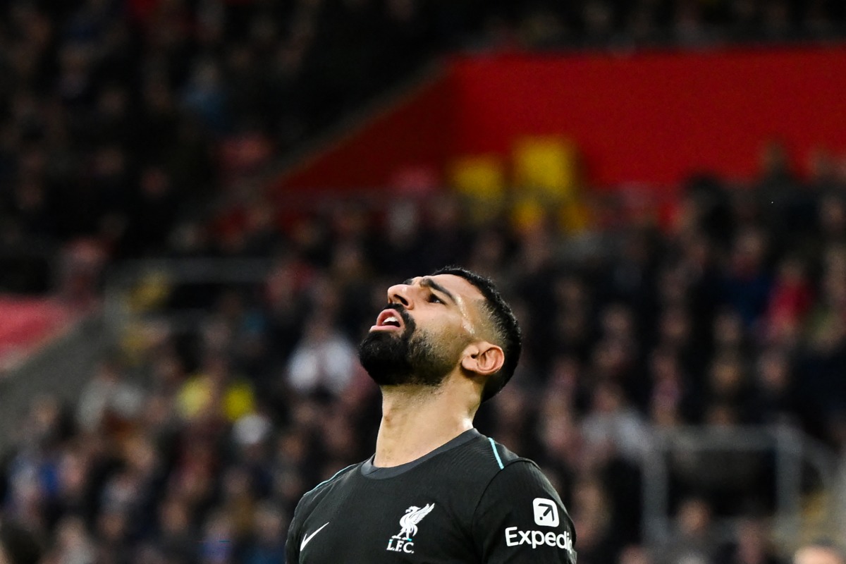 Liverpool's Egyptian striker #11 Mohamed Salah reacts during the English Premier League football match between Southampton and Liverpool at St Mary's Stadium in Southampton, southern England on November 24, 2024. (Photo by JUSTIN TALLIS / AFP)