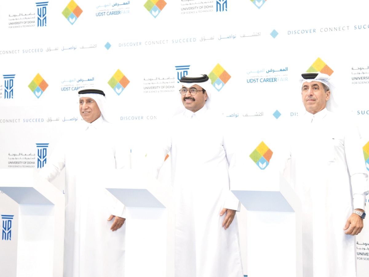 Chairman of UDST’s Board of Trustees, H E Dr. Mohammed bin Saleh Al Sada (centre); MoEHE Undersecretary Dr. Ibrahim bin Saleh Al Naimi (right); and UDST President Dr. Salem Al Naemi (left) inaugurating the career fair.