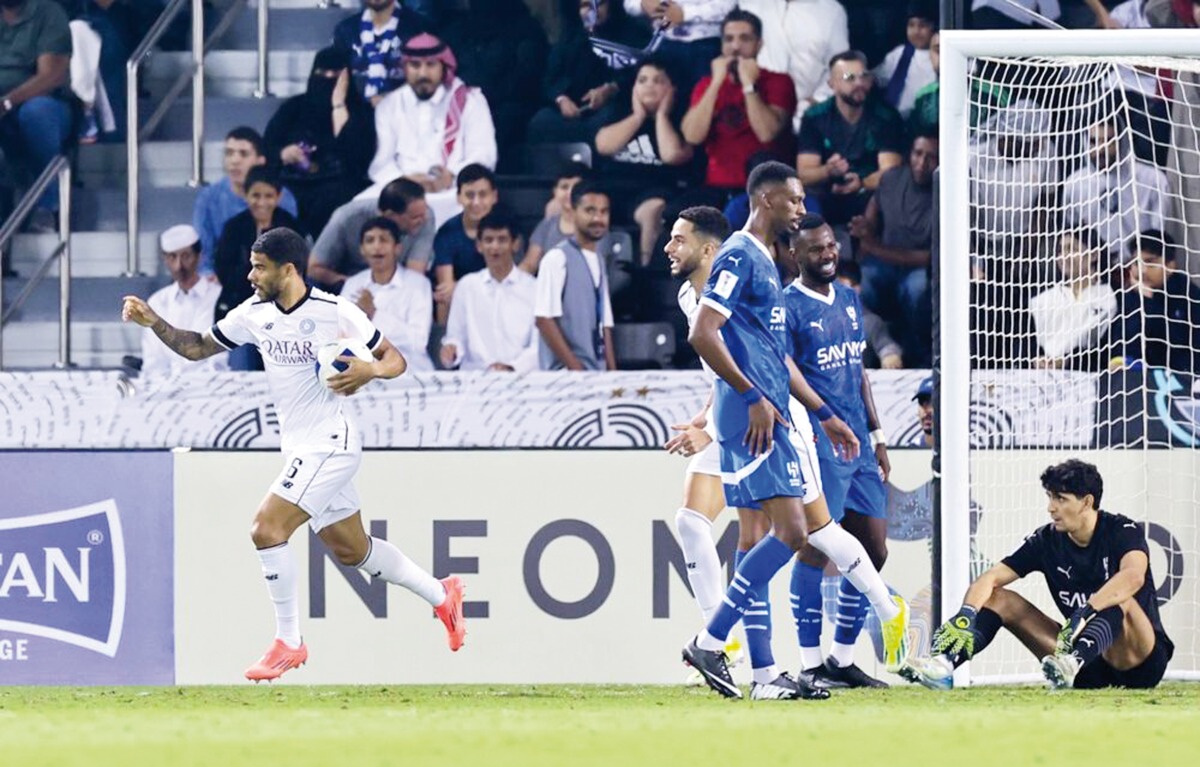 Al Sadd's Paulo Otavio (left) celebrates after scoring the equaliser.