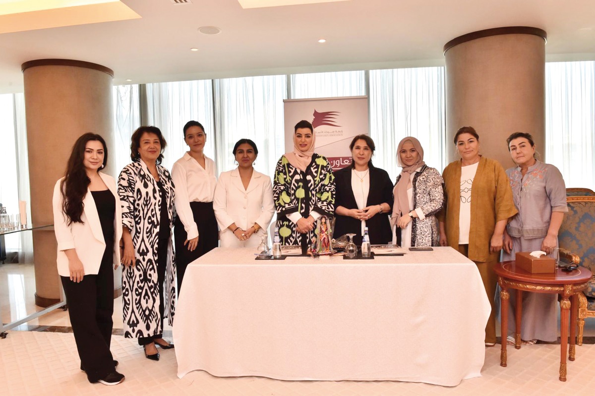 Vice Chairwoman of QBWA Aisha Alfardan, Chairman of the Surkhandarya region Oydin Sharafiddinova with other officials during signing of the MoU.