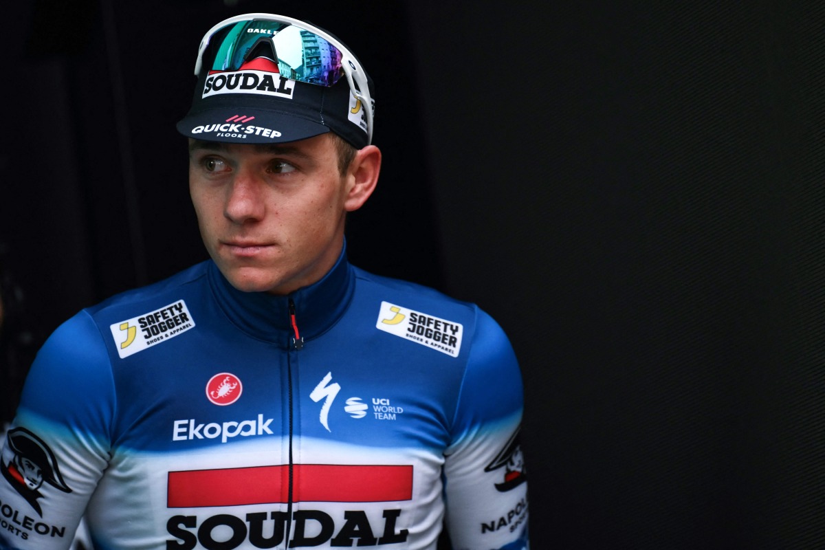 Soudal Quick-Step team's Belgian rider Remco Evenepoel looks on at the podium area after placing second in the 118th edition of the Giro di Lombardia (Tour of Lombardy), a 252km cycling race from Bergamo to Como on October 12, 2024. Photo by Marco BERTORELLO / AFP