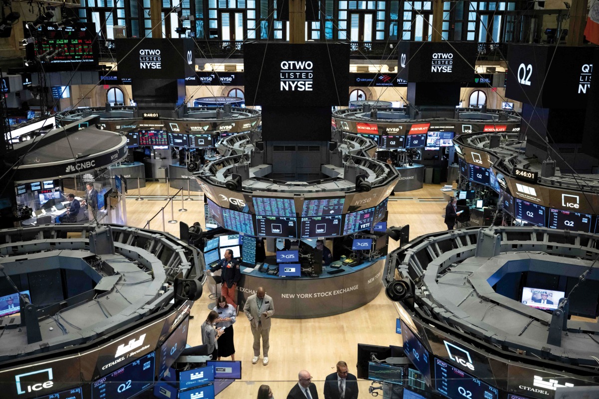 A file photo of the traders working on the floor of the New York Stock Exchange in New York, US. (AFP)