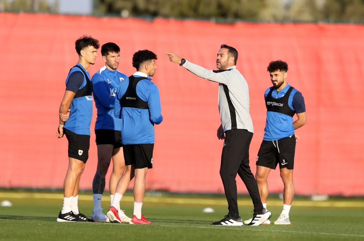 Al Rayyan coach Artur Jorge gives instructions to players during a training session as his team prepares for their upcoming clash against Al Duhail.