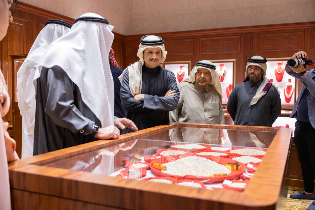 Prime Minister and Minister of Foreign Affairs H E Sheikh Mohammed bin Abdulrahman bin Jassim Al Thani with other dignitaries visiting one of the pavilions during the opening of the Doha Jewellery & Watches Exhibition 2025 at the Doha Exhibition and Convention Center yesterday.