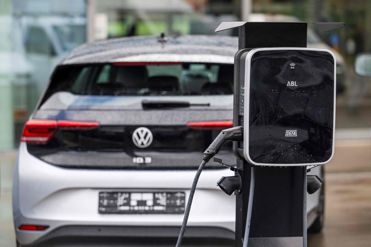 A charging box for electric cars is pictured at a Moller Bil Volkswagen car dealership outside the Norwegian capital of Oslo, on September 25, 2024. Photo by Jonathan NACKSTRAND / AFP