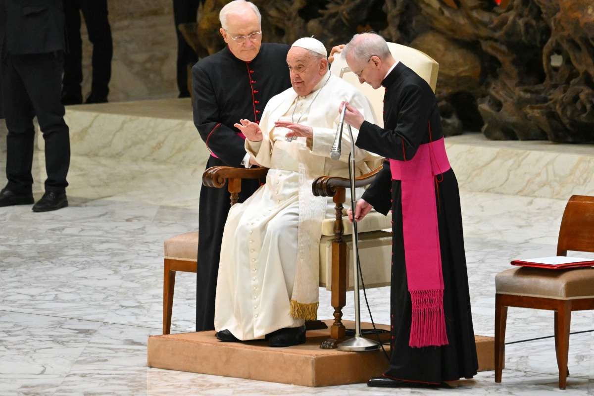(FILES) Pope Francis gestures during an audience of the Jubilee of the World of Communication, at Paul-VI hall in the Vatican on January 25, 2025. (Photo by Andreas SOLARO / AFP)

