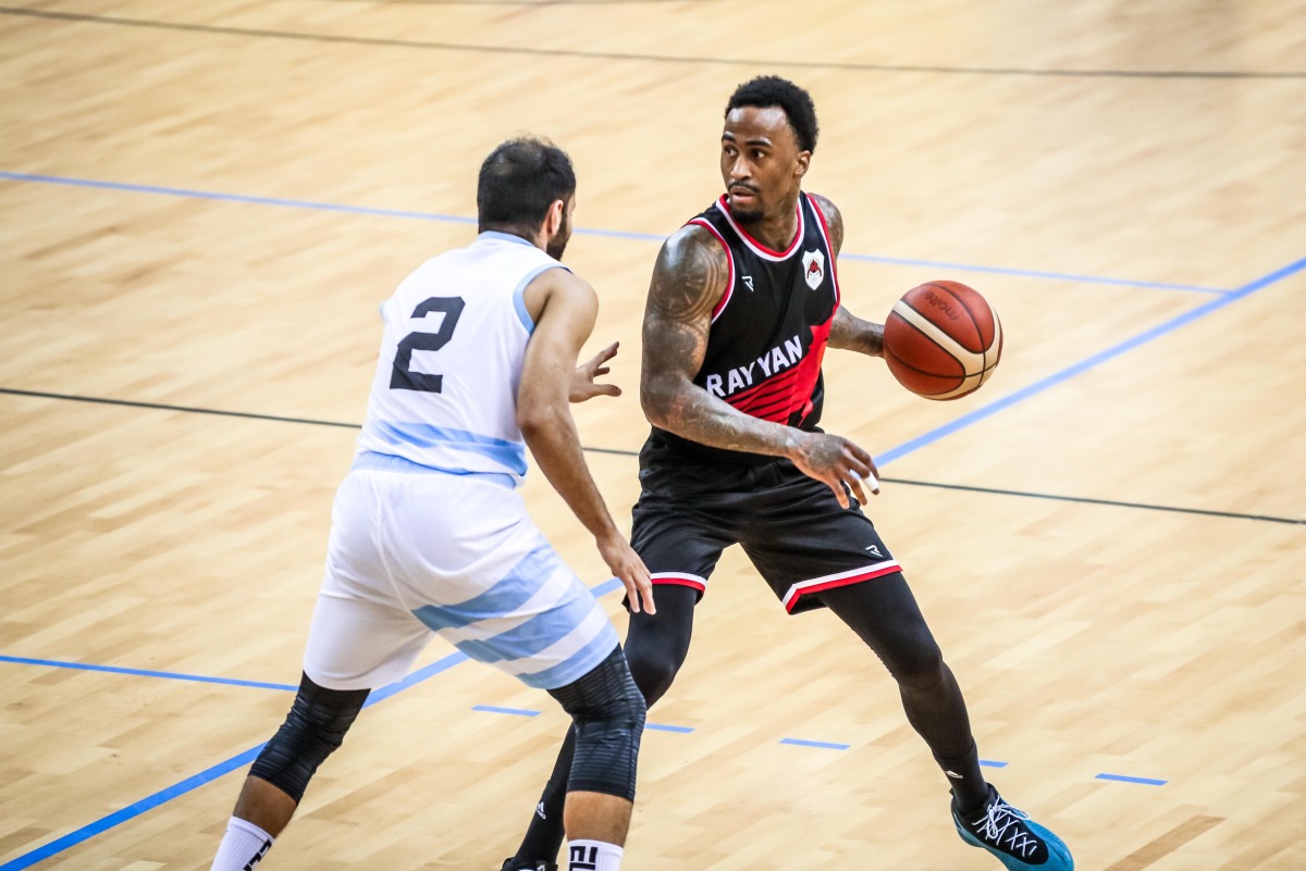 Al Rayyan's Demarquis D’Angelo Bost (right) and Al Wakrah's Omar Saad in action.