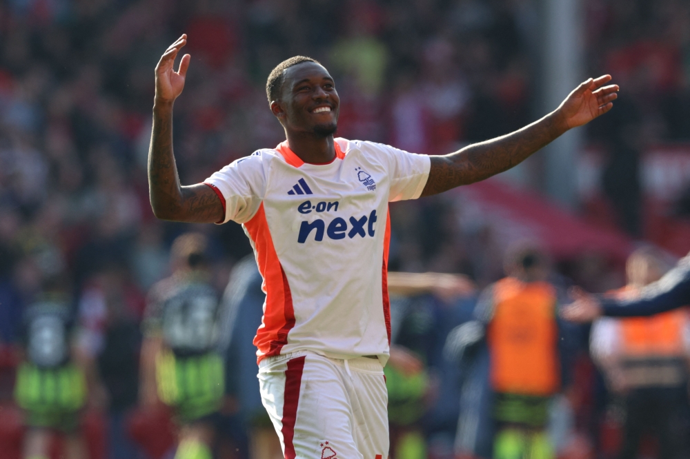 Goalscorer Nottingham Forest's English midfielder #14 Callum Hudson-Odoi celebrates after the English Premier League football match on March 8, 2025. (Photo by Darren Staples / AFP) 