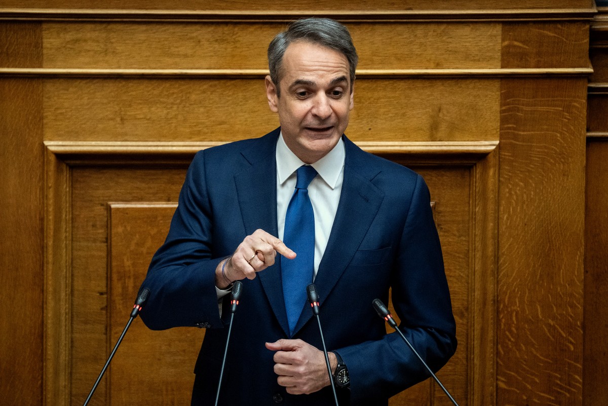 Greek Prime Minister Kyriakos Mitsotakis addresses the audience at the Greek Parliament in Athens, on March 5, 2025. Photo by Angelos TZORTZINIS / AFP