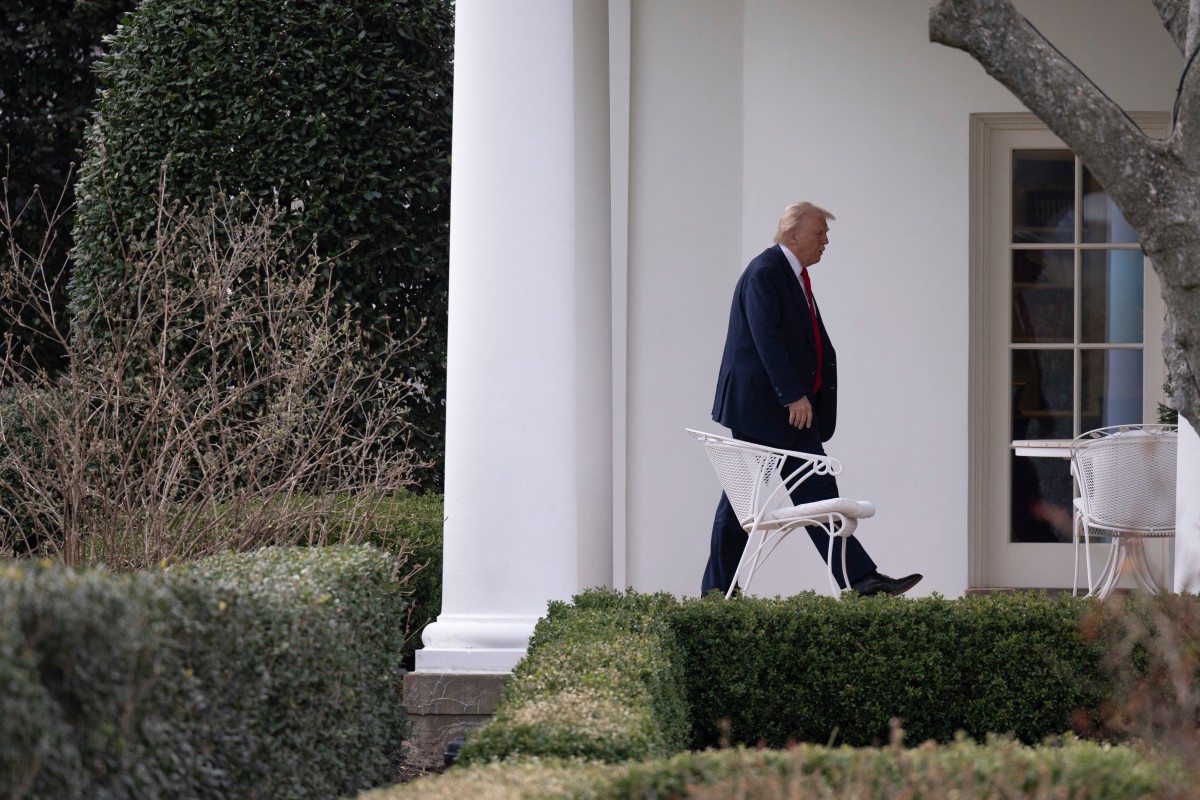 US President Donald Trump walks to the Oval Office at the White House in Washington, DC, on March 14, 2025 after speaking at the Justice Department. (Photo by ROBERTO SCHMIDT / AFP)