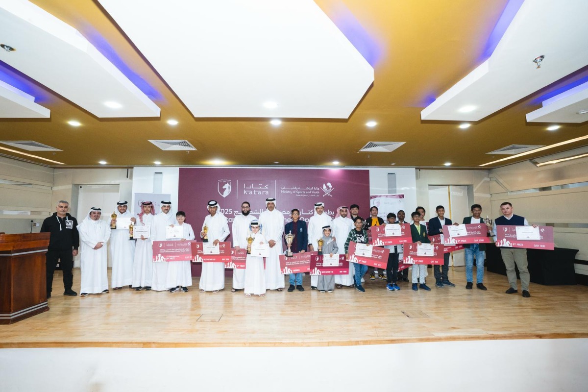 QCA President Mohammed Al Mudahka poses with winners of the event. 