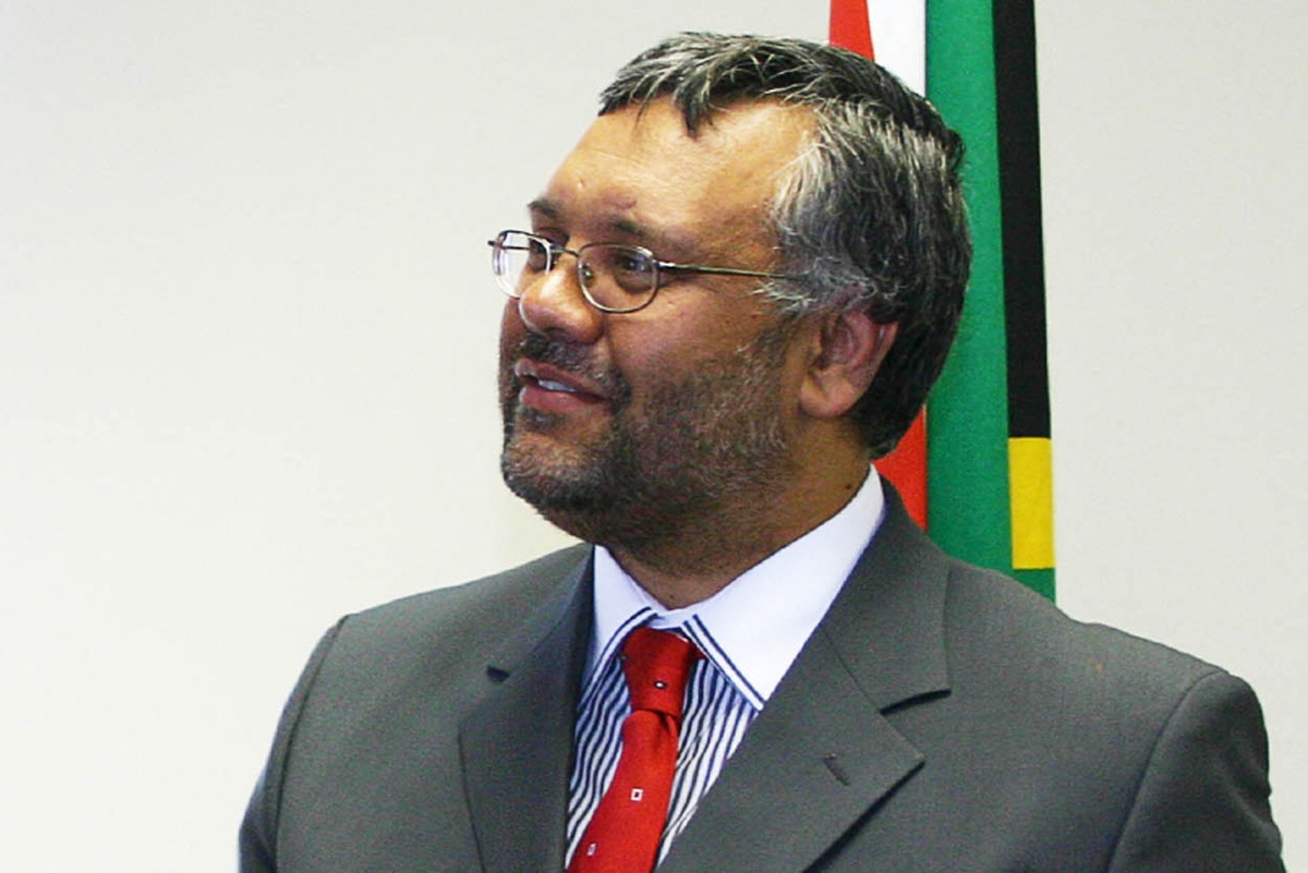 (FILES) Prince Albert of Monaco (unseen) shakes hands with South Africa Premier Ebrahim Rasool ahead of signing a memorandum of Understanding between the Principality of Monaco and South Africa on December 29, 2005. (Photo by AFP)
