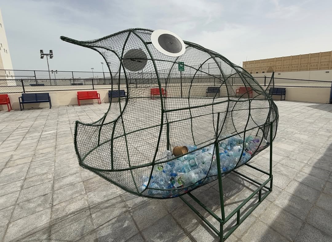 A large fish-shaped cage has been set up for students to fill with plastic bottles, which will later be recycled.