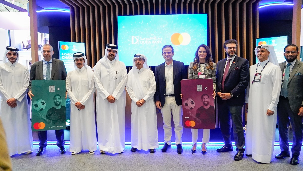 Doha Bank and Mastercard officials pose for a group photo.