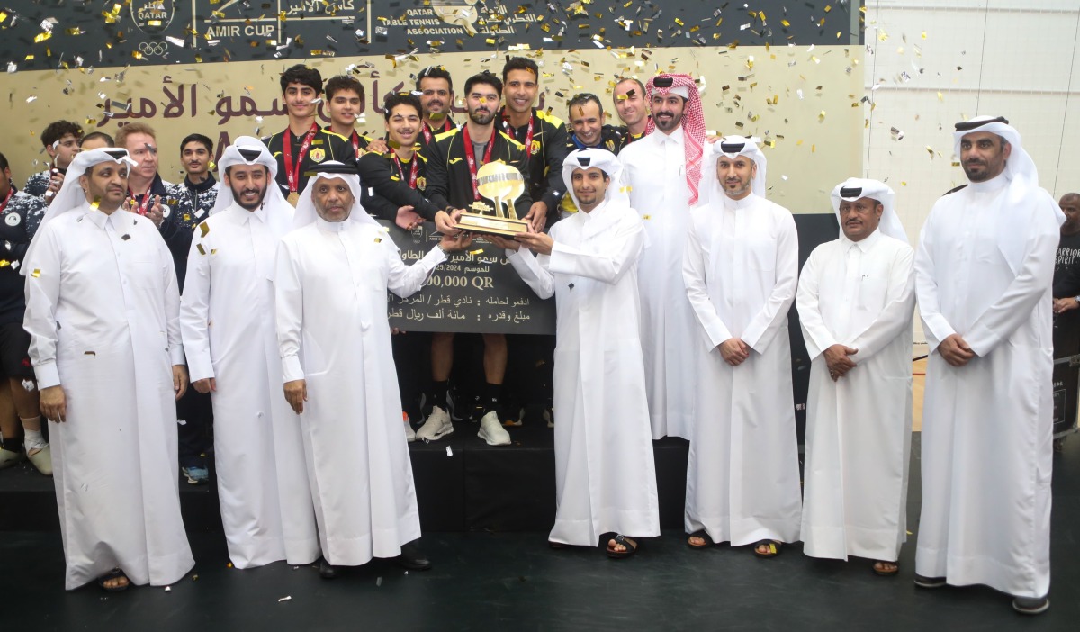 QTTA President Khalil Al Mohannadi handed the  Amir Cup to Qatar SC captain.  