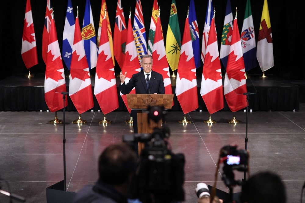 Canada's Prime Minister Mark Carney speaks during a press conference after the First Ministers Meeting in Ottawa, Canada on March 21, 2025. (Photo by Dave Chan / AFP)
