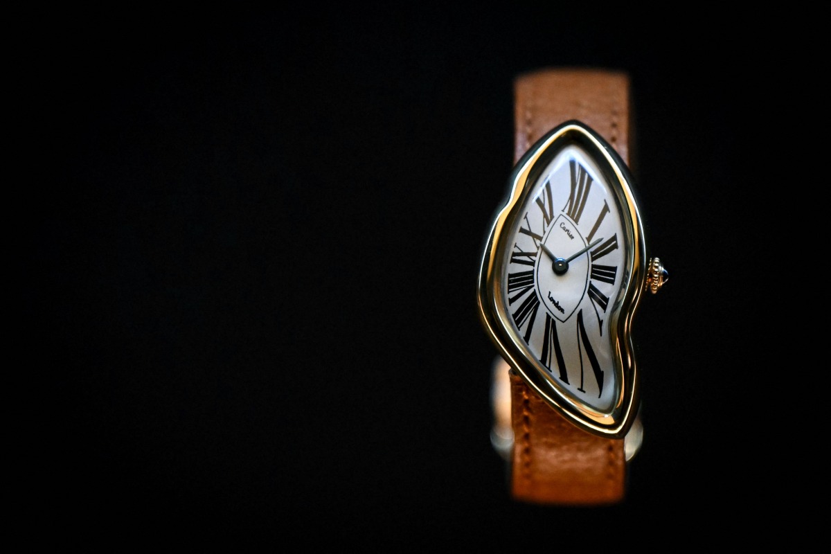 The Crash wristwatch dated from 1967 is pictured during a photocall for the forthcoming Cartier exhibition at the V&A (Victoria and Albert) museum in London, on April 9, 2025. Photo by JUSTIN TALLIS / AFP