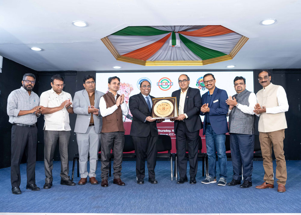 Ambassador of India to Qatar H E Vipul with other officials during the event.